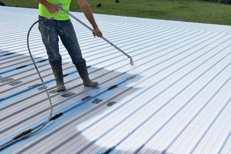 homeguide-contractor-coating-and-sealing-a-metal-roof-thumb